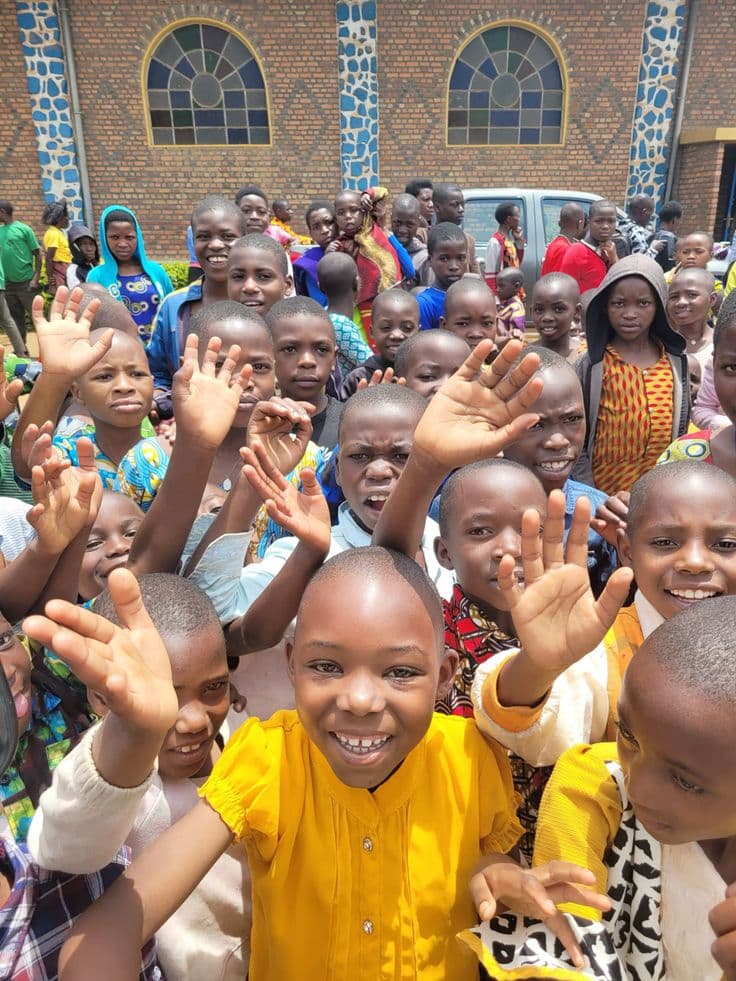 School children waving during a conservation club visit